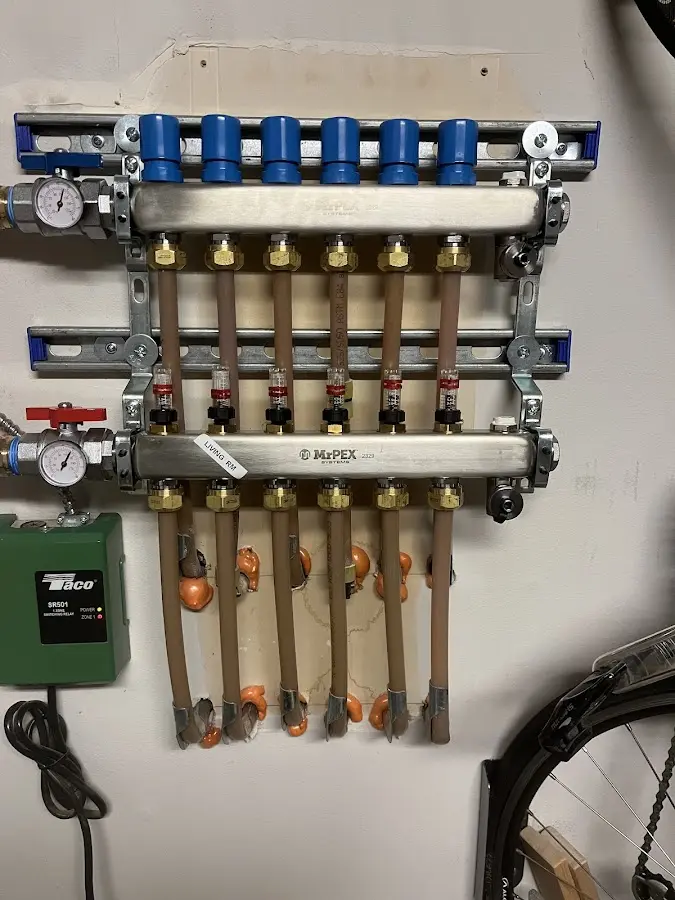 Plumber performing Water Heater Repair at a residential property in South Jordan